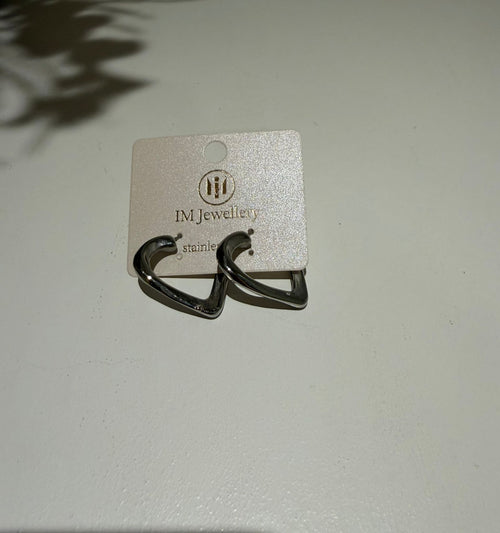 Zilverkleurige Oorbellen met Open Hartdesign
