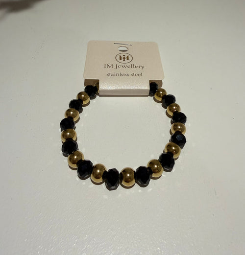Goudkleurige Armband met Zwarte Facetkralen
